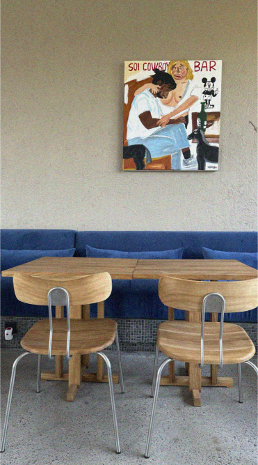 Daytime corner — blue banquette + pop art canvas